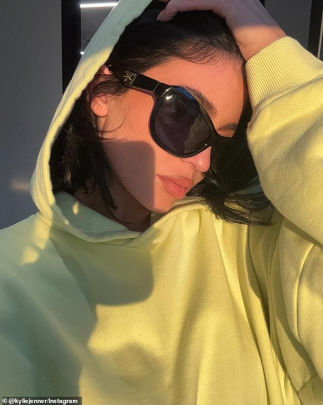 The Keeping Up With The Kardashians alum would intensify the cool factor with dark shades