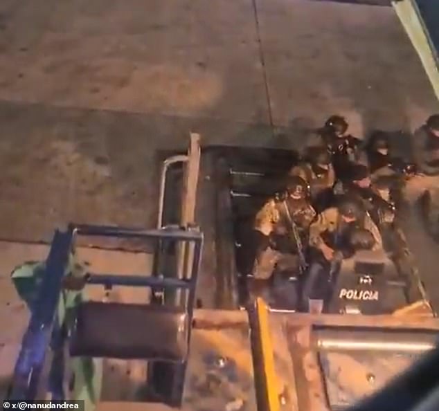 The chilling incident caused armed officers to storm the cargo hold upon their return, which was captured on spectacular video.