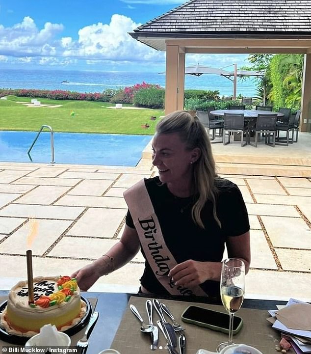 She drank champagne and wore a sash as they sat poolside.