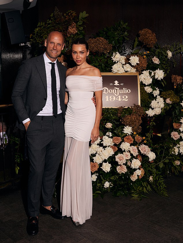 Bar Bambi owner Nick Russian and his influential wife, Rozalia, were also at the after-party. Rozalia, who has 267,000 followers on Instagram, wore an elegant white off-the-shoulder dress. Both in the photo