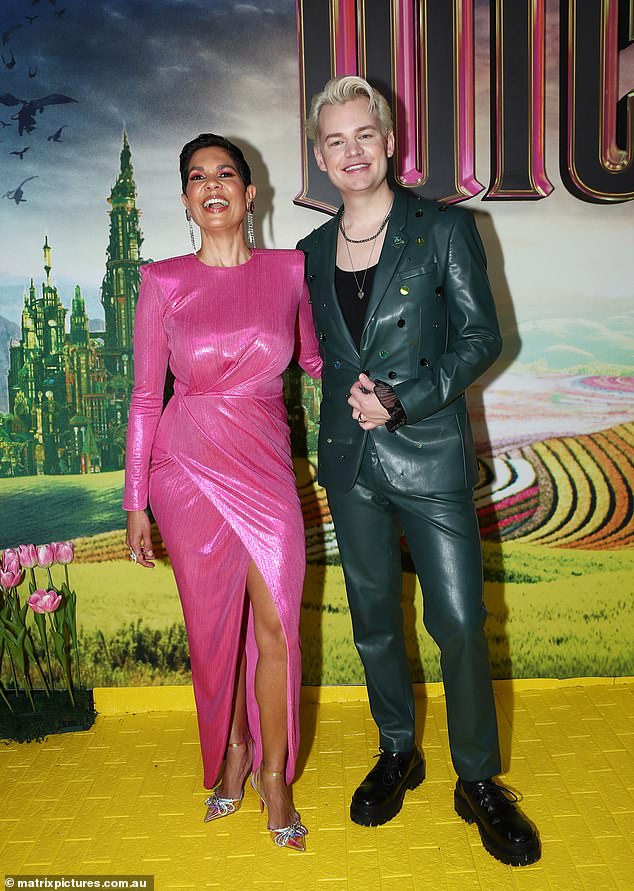 Channel 10 host Narelda Jacobs sparkled in a cut-out sequin dress and posed alongside Joel Creasey for a photo.