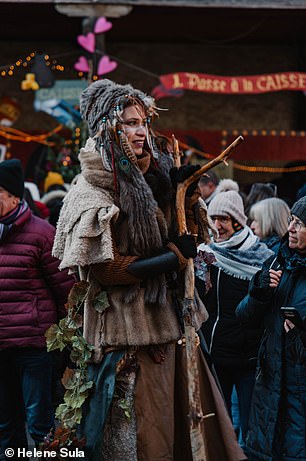 A costumed market visitor in Ribeauville