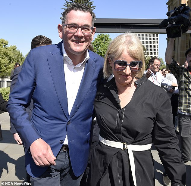 Andrews (pictured with his wife) received the medal on Sunday for his 