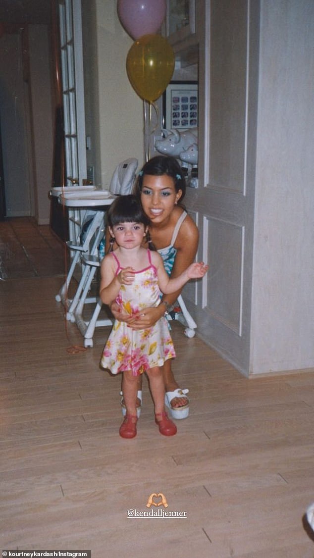 Kourtney chose to post an adorable throwback to her childhood with Kendall while giving her little brother a hug.