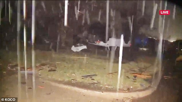 Home video shows heavy rain hitting Oklahoma during tornadoes and storms early Sunday morning.