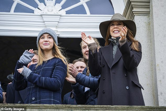 Queen Mary reacts as the crowd cheers during the annual event today