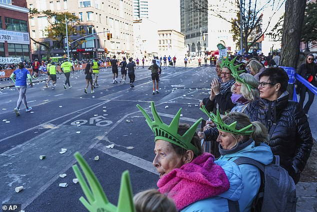 New Yorkers lined the streets to cheer on the amateurs and professionals in Sunday's race.