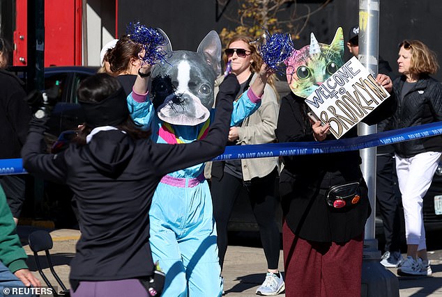 Spectators welcome runners to Brooklyn as they pass through New York's five boroughs