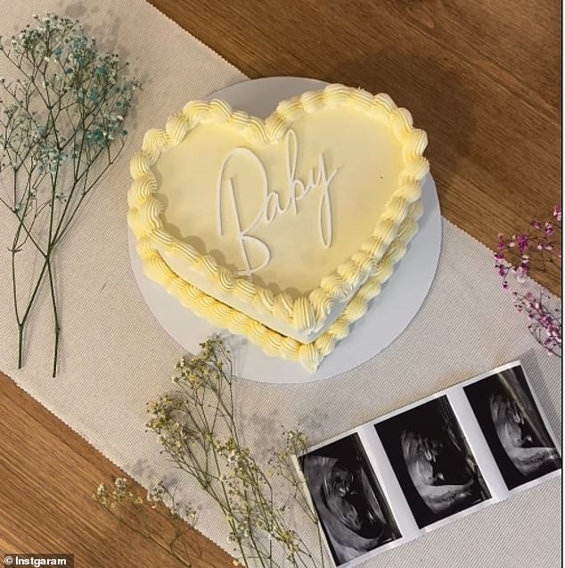 The couple, who have been dating for three years, were overcome with emotion after cutting into a gender reveal ice cream cake and discovering a blue sponge cake inside.