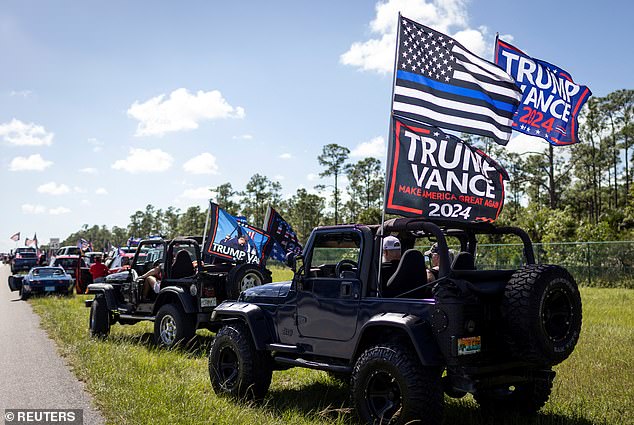 Supporters of the Republican presidential candidate and Trump attend a parade in West Palm Beach, Florida, with 48 hours until Election Day.