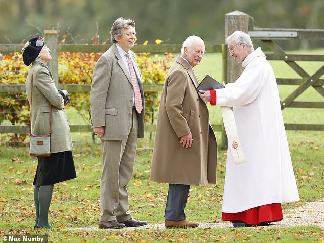 Other guests at the service also looked stylish in similar dress coats and warm winter hats to ward off the morning chill.