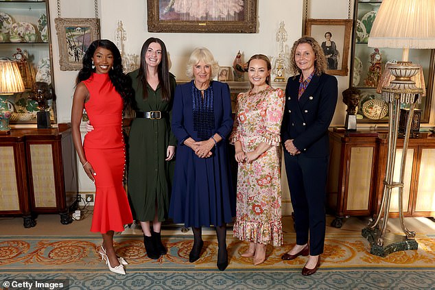 Queen Camilla (centre) poses with (from left) Rehema Muthamia, Emma Armstrong, Alice Liveing ​​and Sharon Baker.