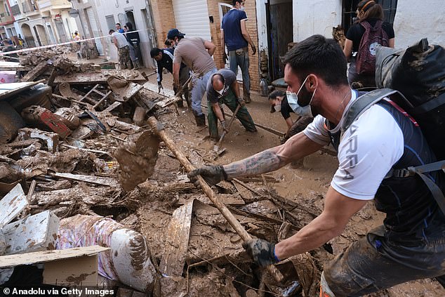 The Spanish army begins work on cleanup after deadly flooding in the Valencian town of Paiporta, Spain, on November 3, 2024.