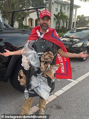 Donald Trump Jr. poses in his unorthodox suit to hit back at Joe Biden for calling 