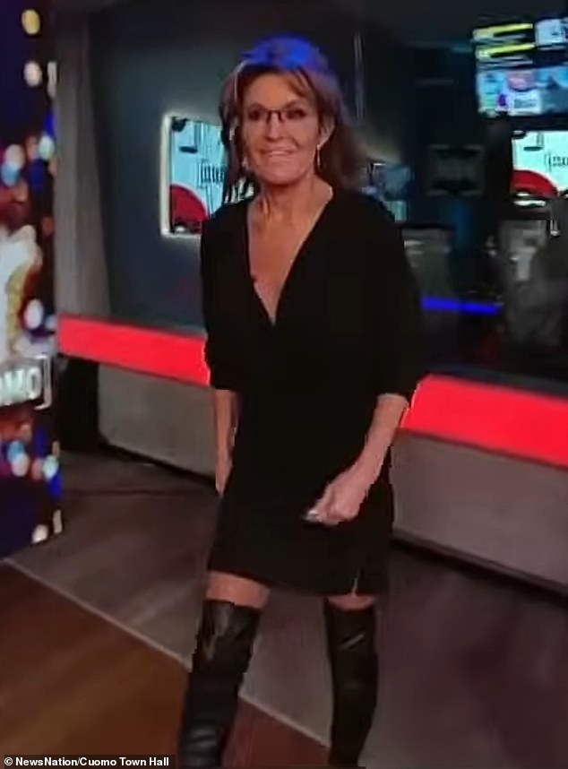 but some seemed more interested in the former vice presidential candidate's clothing than in what she said, considering her too daring for such an appearance. The dress featured a hanging neckline and was accessorized with knee-high leather boots.