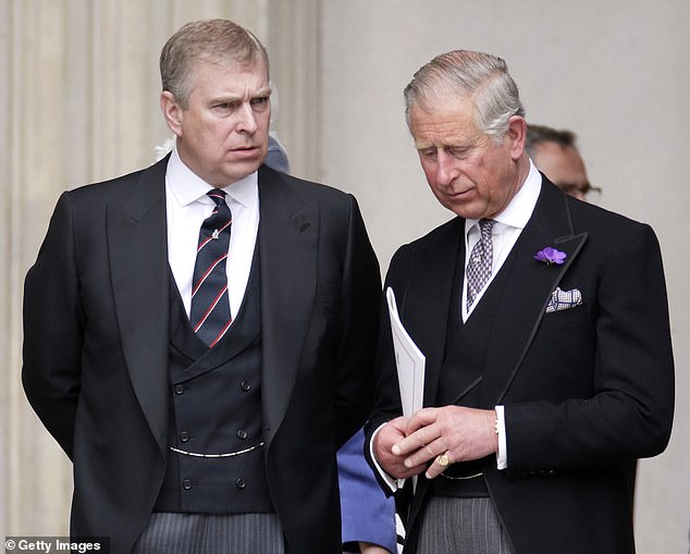 Prince Andrew and Charles attend a Thanksgiving service to celebrate Queen Elizabeth II's Diamond Jubilee in June 2012.