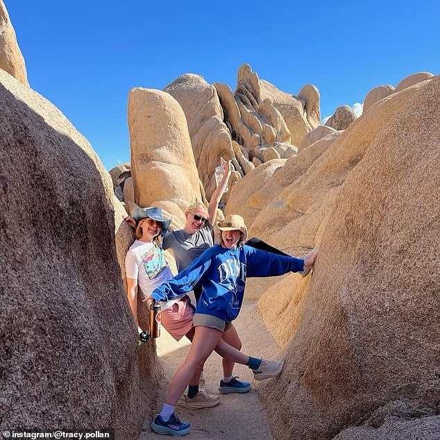 More photos from the same trip showed Esmé representing her alma mater in a blue Duke sweatshirt while walking with her mother and one of her sisters through a picturesque formation of rocks and boulders.