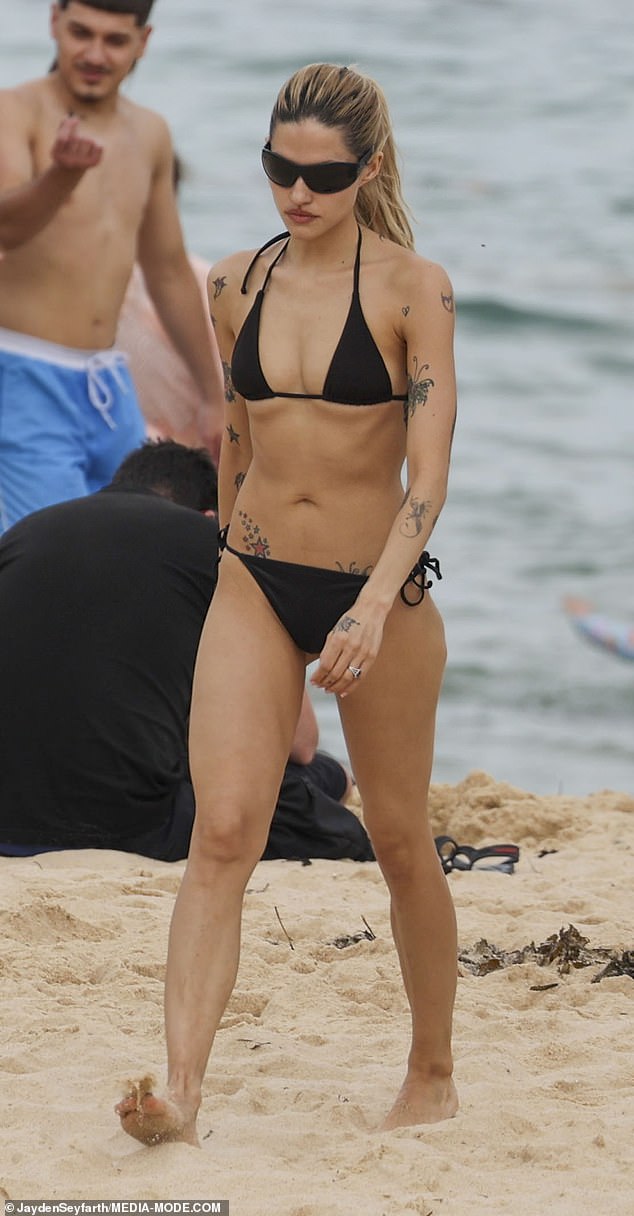 Gabbriette put on a hot show in a tiny black bikini that showed off her slender figure and numerous tattoos.