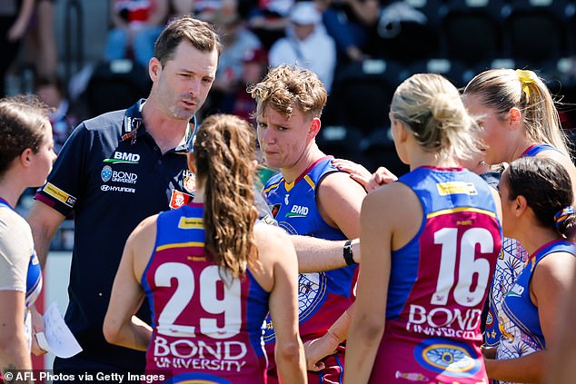 Davidson's teammates and coaches joined her, and the two-time premiership winner scored a goal and a goal in the match.