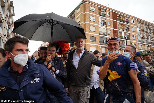 A crowd of angry survivors threw mud and shouted insults at King Felipe VI and Queen Letizia, as well as government officials, as they made their first visit to one of the worst-affected cities on Sunday.