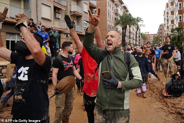 Angry residents of Paiporta shout during the visit of King Felipe VI of Spain to this city, in the Valencia region of eastern Spain, on November 3, 2024.