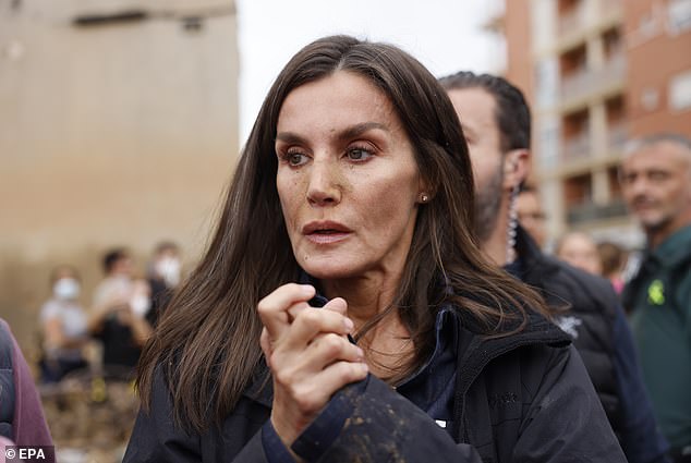 Queen Letizia could be seen with mud stains on her face