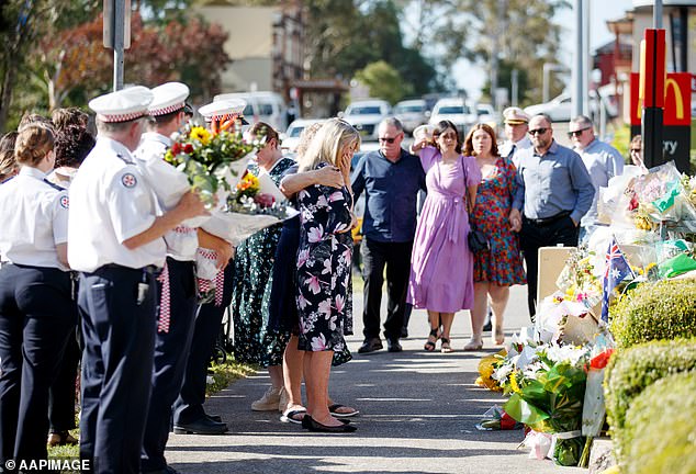 Crown prosecutor Ken McKay SC said Tougher was unable to escape from Fineanganofo because he was trapped between the back of the ambulance and his attacker (pictured, Tougher's funeral).