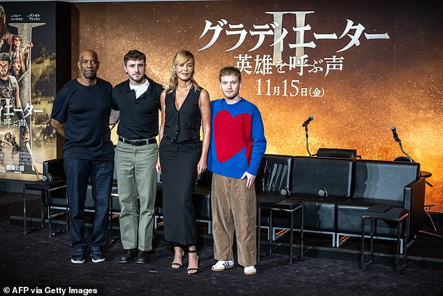 The cast of Gladiator II posed for a photo (LR Denzel Washington, Paul, Danish actress Connie Nielsen and American actor Fred Hechinger)