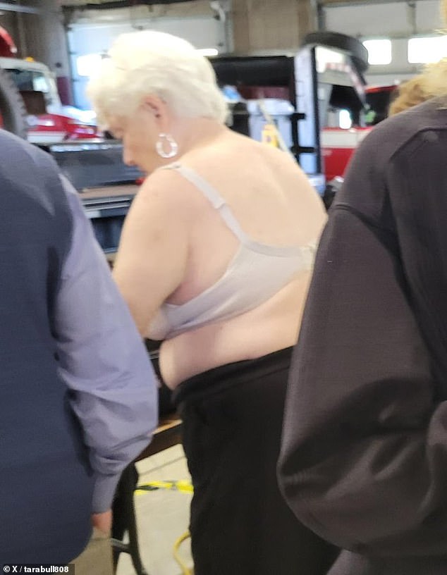 Some voters were forced to remove clothing that supported a candidate and vote in their underwear, like this woman in