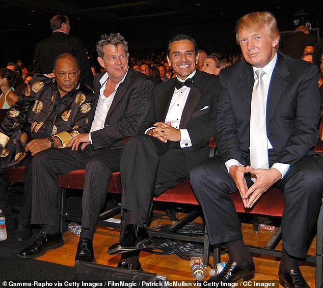 Jones (far left) photographed with Donald Trump (far right), whom he called a 'megalomaniacal narcissist' in the 2018 interview.