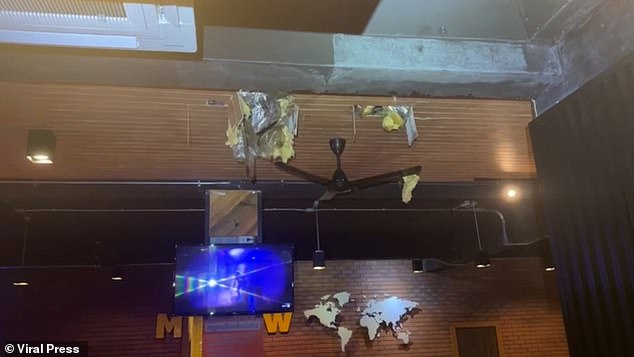 The police department confirmed that the Briton only suffered minor injuries when emergency services freed him from the wooden ceiling boards.