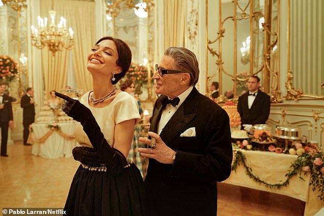 Jolie as Maria Callas, left with Haluk Bilginer as Aristotle Onassis in Maria