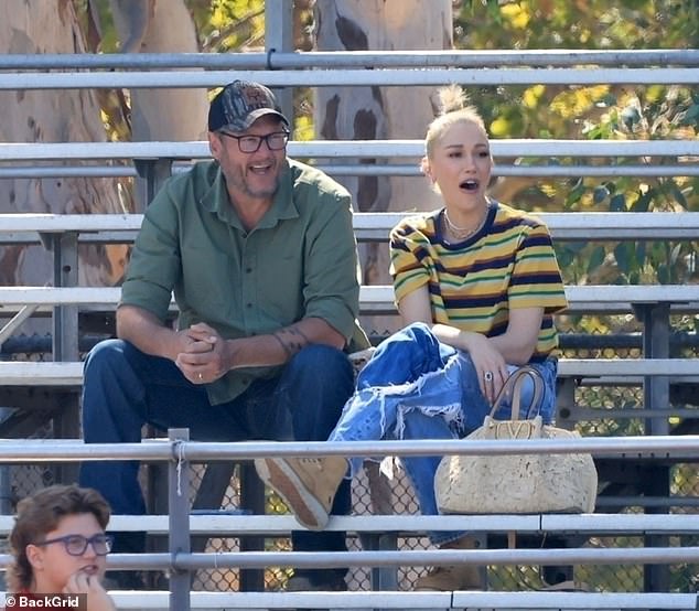 Blake and Stefani enthusiastically cheered on little Apollo from the sidelines