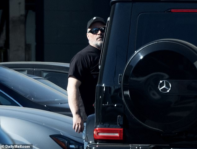 LeBlanc was photographed hard at work in the dealership parking lot, while his distinctive black $149,000 Mercedes G-Wagon was parked outside.