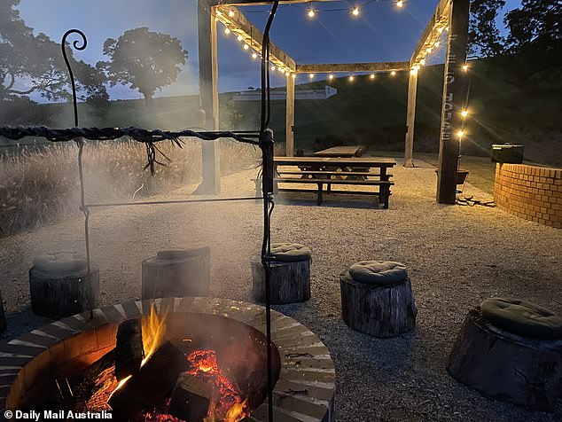 Guests enjoy cocktails by the fire, under the stars (pictured)