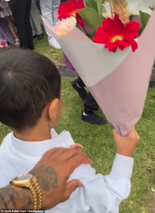 Addo-Carr posted a clip of her son placing flowers on his grandmother's grave.