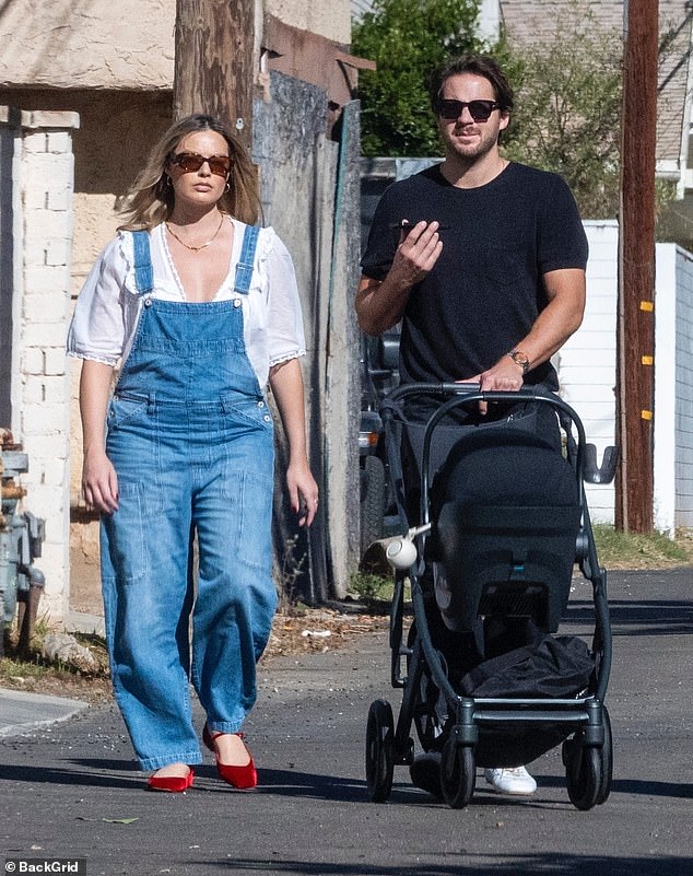 The Barbie star enjoyed a leisurely stroll with her newborn son and husband Tom Ackerley, 34.