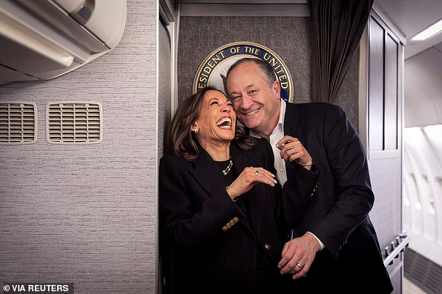 Vice President Democratic presidential candidate Kamala Harris, left, shares a laugh with Second Gentleman Doug Emhoff after meeting in Pittsburgh, Monday, Nov. 4, 2024.