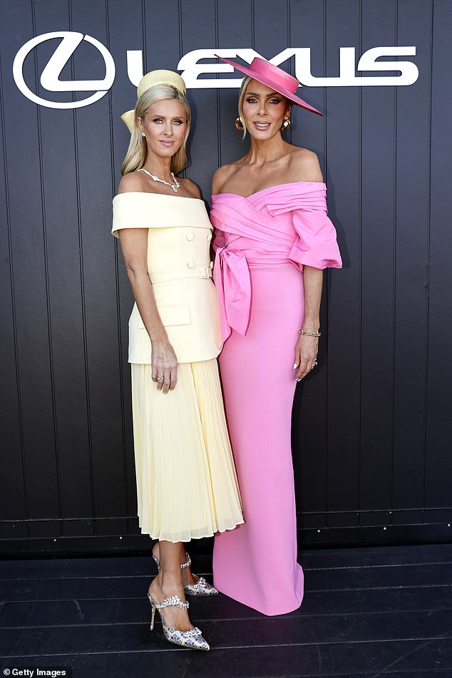 Rebecca Vallance (right) led the way for this second trend of the event while posing with Nicky Hilton.