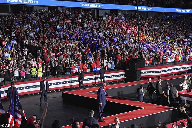 MAGA fans cheer loudly when Trump arrives