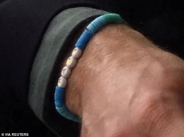 Prince William's friendship bracelet bears the word 'Dad', as his children call him