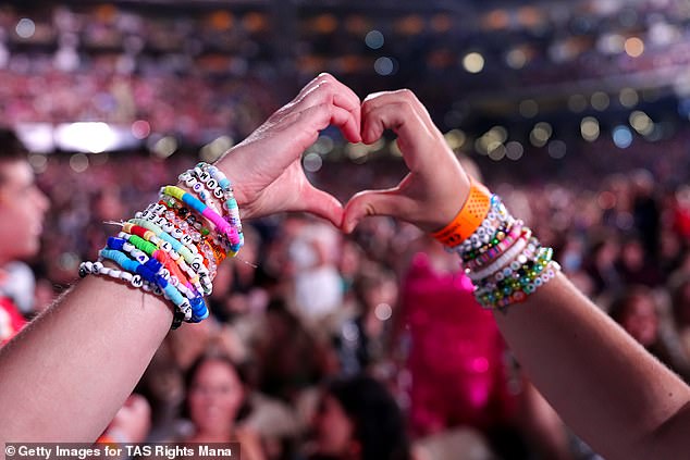 Fans wearing friendship bracelets during a Taylor Swift concert in New Orleans last month.