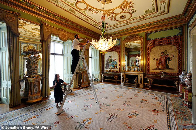 Preparations take place in the Central Room in the east wing of Buckingham Palace in June.