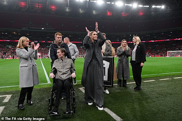 Darby attended last month's women's match between England and Germany with Houghton.