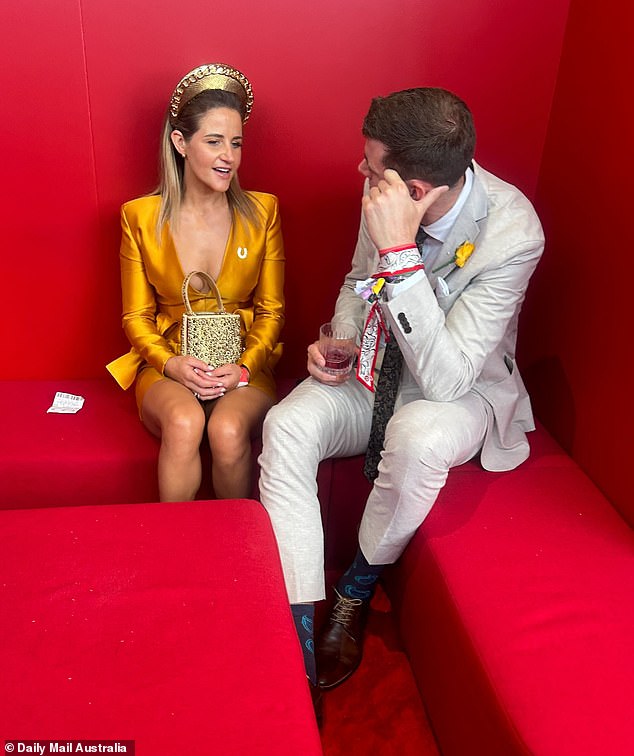 The famous couple appeared to get on like a house on fire in a luxury tent during the Melbourne Cup at Flemington Racecourse.