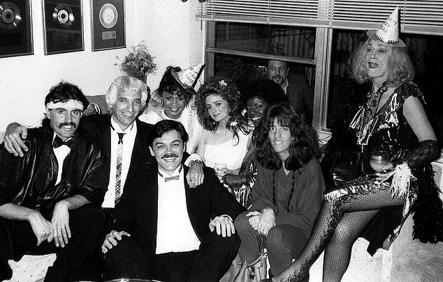 Tony Chase, Diamond, Wendy Edmead, Robey, Gaynor, Liz Swados, Sylvia Miles, Randy Jones (LR) photographed at Diamond's Penthouse circa 1984