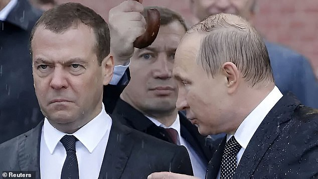 Former Russian President Dmitry Medvedev, now a senior Kremlin security official, pictured with Vladimir Putin.