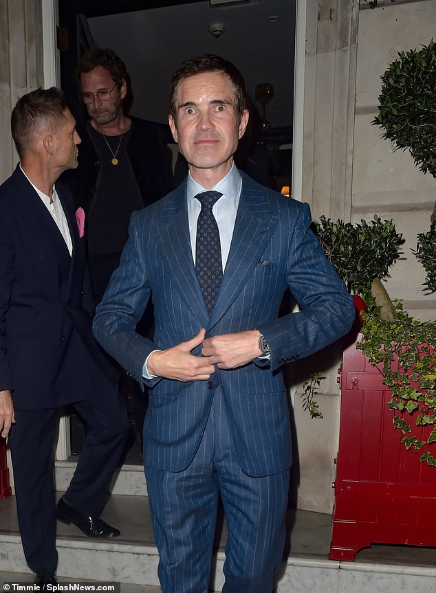 Jimmy Carr made a dapper appearance as he arrived wearing a blue pinstripe suit with a pale blue shirt and tie.