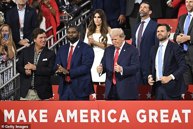 Tucker Carlson sat next to the former president at the Republican National Convention in July (pictured) and has been campaigning for him across the country.