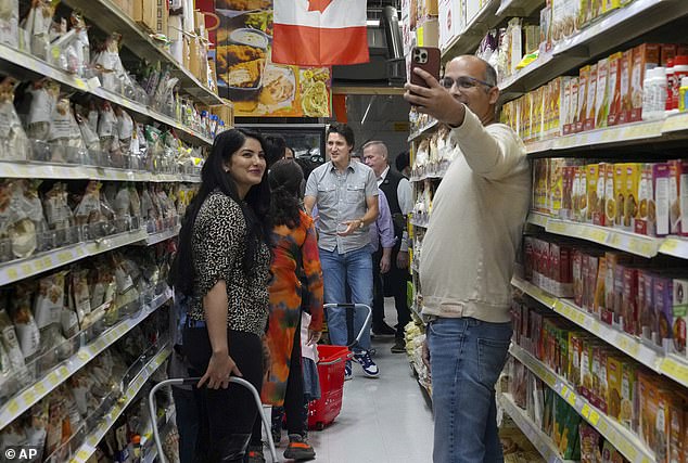 Canada's Prime Minister Justin Trudeau visits Desi Food Mart in Cambridge, Canada, on October 6, after his government announced new measures to combat food inflation.